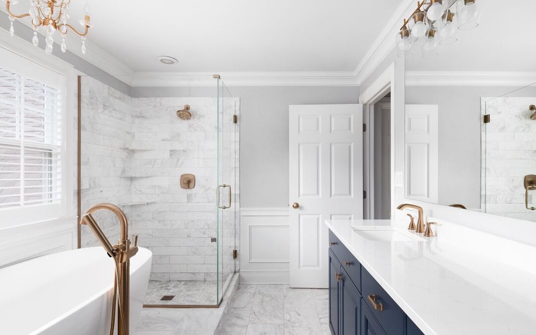 Bathroom with a freestanding tub and floor mounted faucet, the kind of fixture that may prompt repiping during remodeling