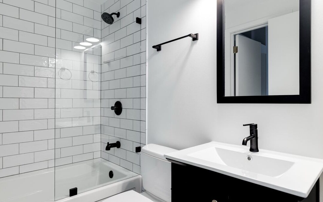 White subway tile tub and shower combination, a common starting point for a tub to shower conversion